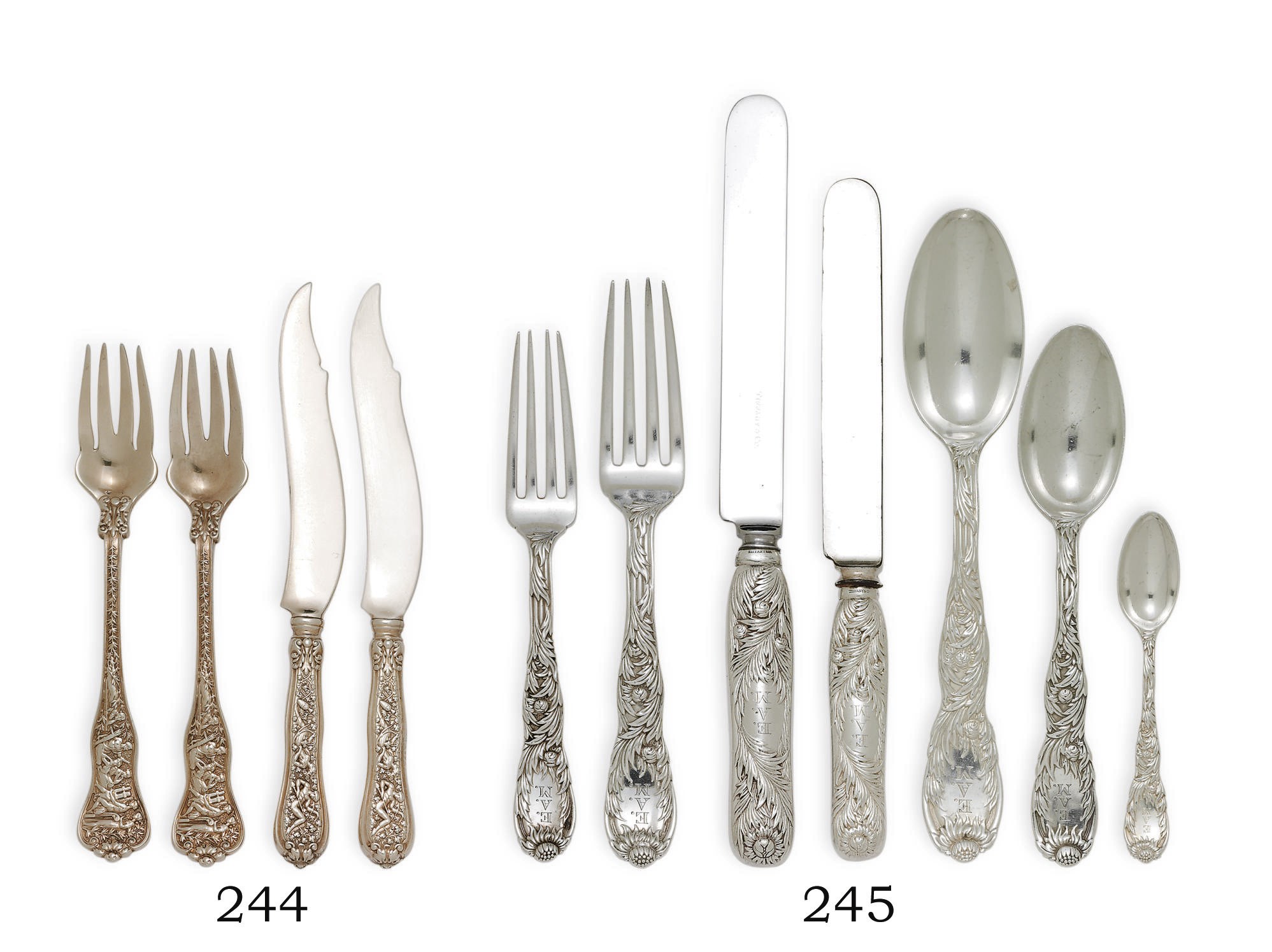 A SET OF TWELVE AMERICAN SILVER-GILT FISH FORKS AND TWELVE FISH KNIVES