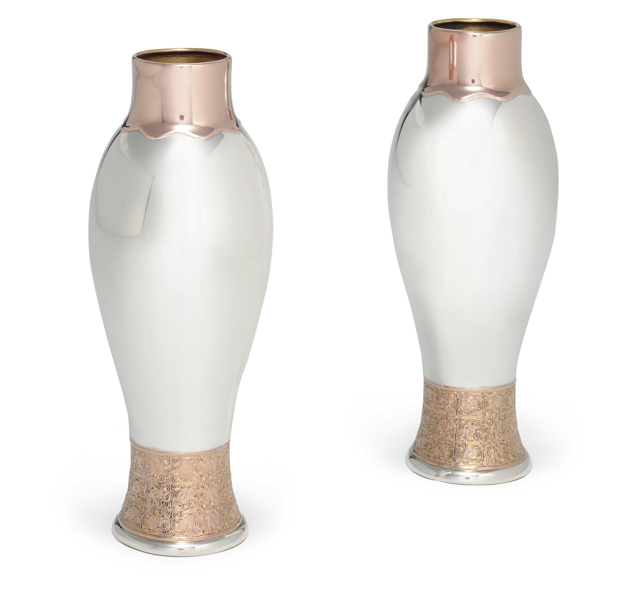 A PAIR OF AMERICAN SILVER AND COPPER VASES