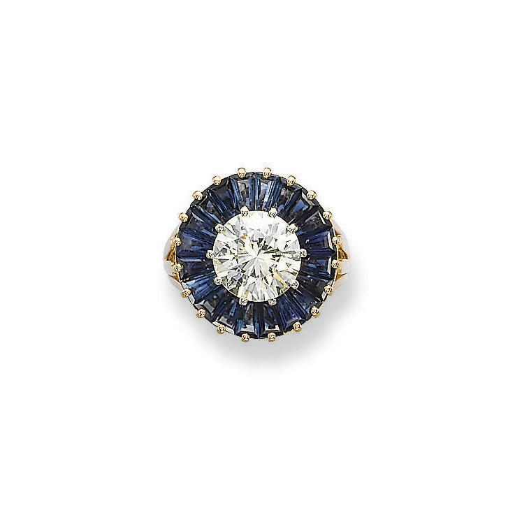 A SAPPHIRE AND DIAMOND RING, BY SCHILLING