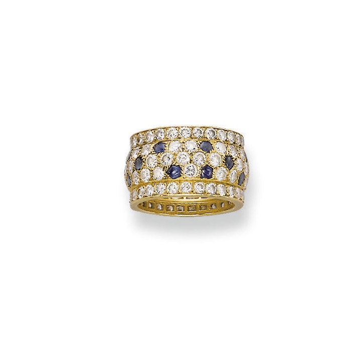 A DIAMOND AND SAPPHIRE 'PANTHER' RING, BY CARTIER