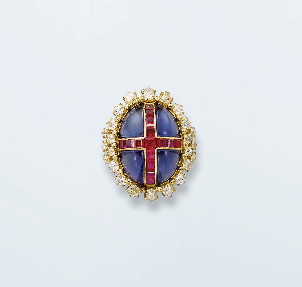 A SYNTHETIC SAPPHIRE, RUBY AND DIAMOND RING