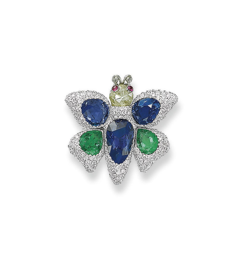 AN AMUSING SAPPHIRE, EMERALD AND DIAMOND BUTTERFLY RING, BY AGGRAVI