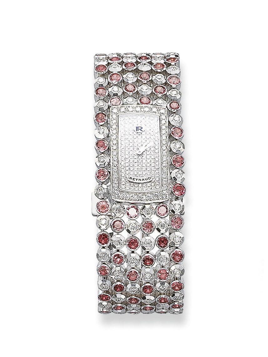 A LADY'S PINK TOURMALINE AND DIAMOND 'GEMTWIST' WRISTWATCH, BY REYNAUD