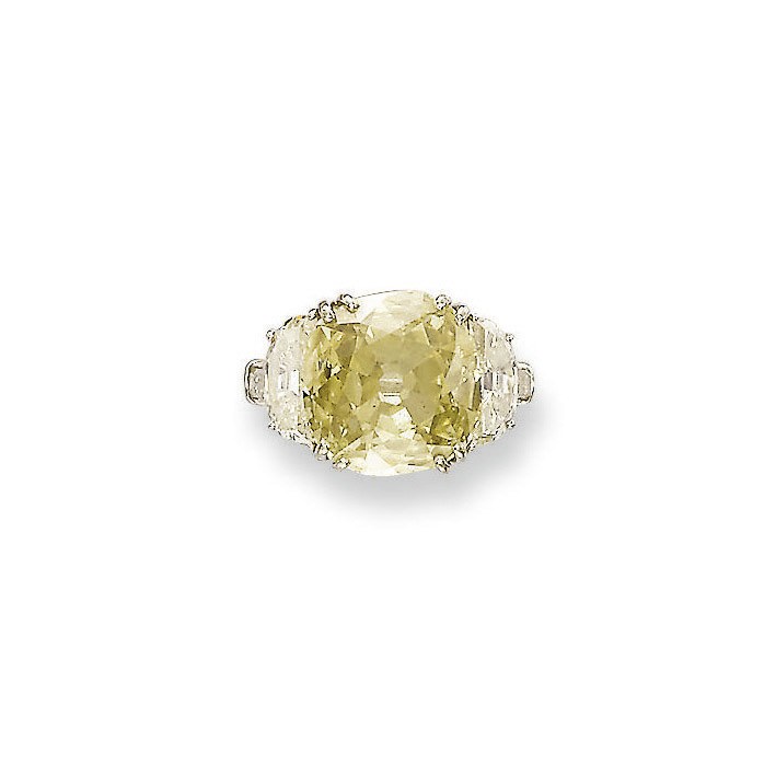 A COLOURED DIAMOND AND DIAMOND RING