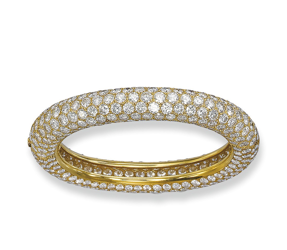 A DIAMOND BANGLE, BY CARTIER