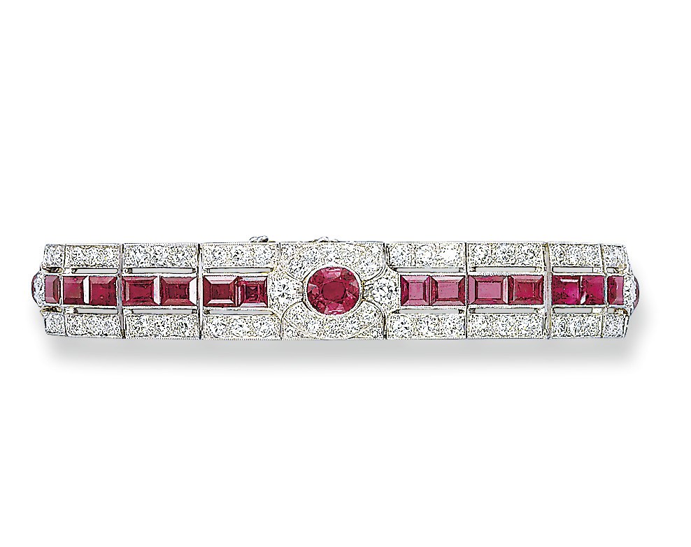 AN ART DECO RUBY AND DIAMOND BRACELET, BY HENNELL