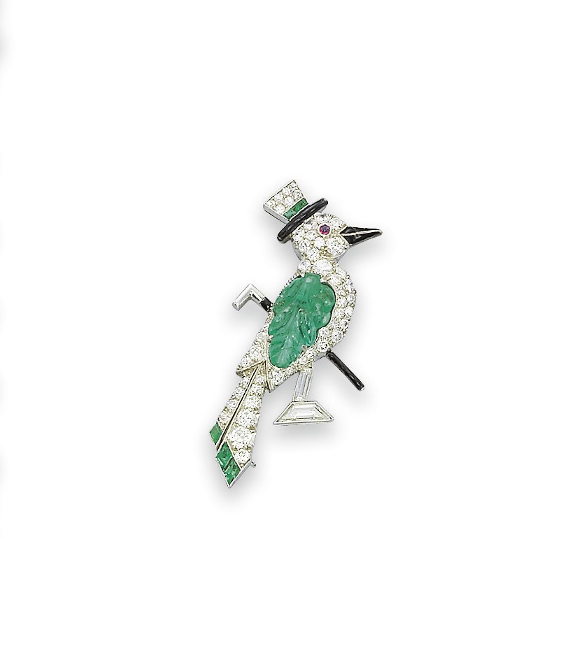 A WHIMSICAL ART DECO EMERALD, ONYX AND DIAMOND BROOCH, BY UDALL & BALLOU