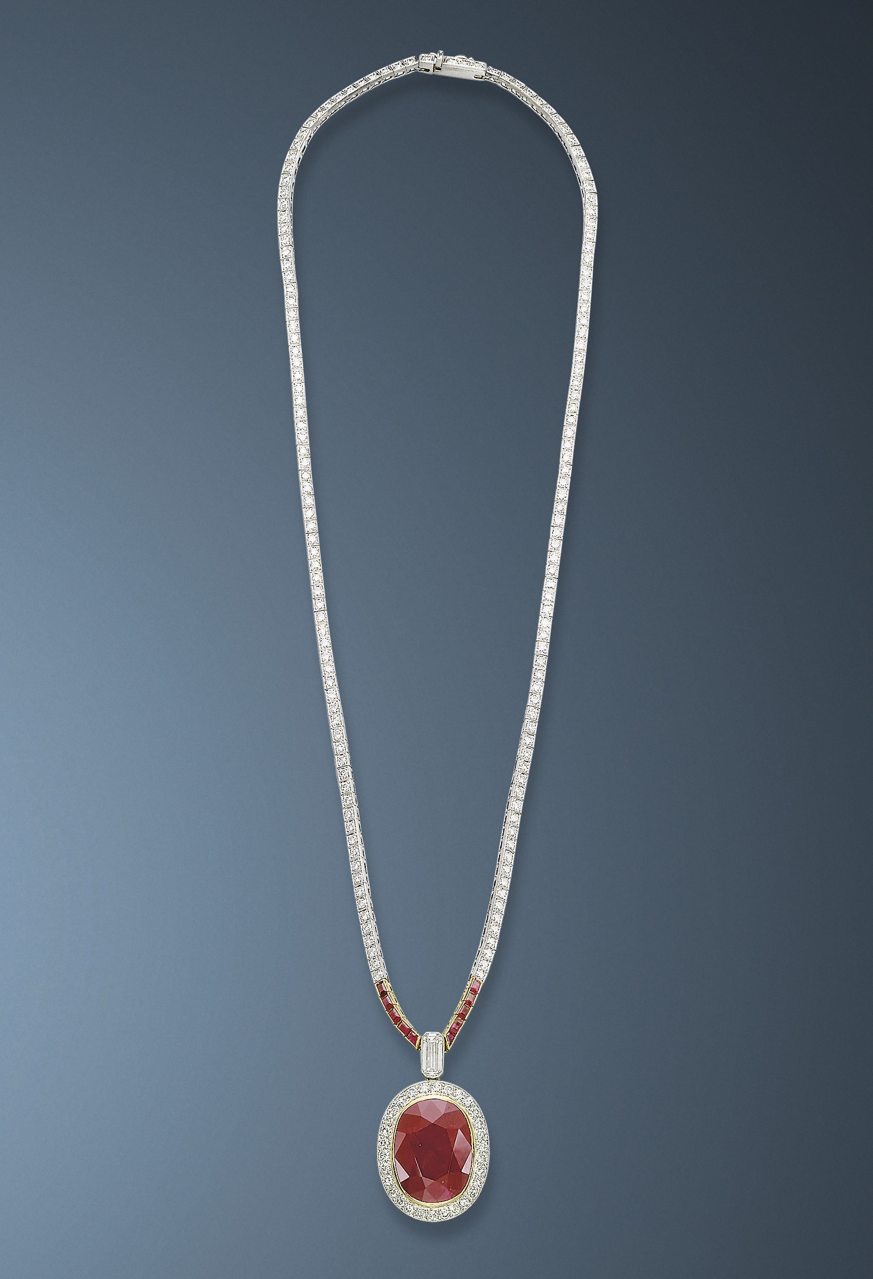 A RUBY AND DIAMOND PENDENT NECKLACE