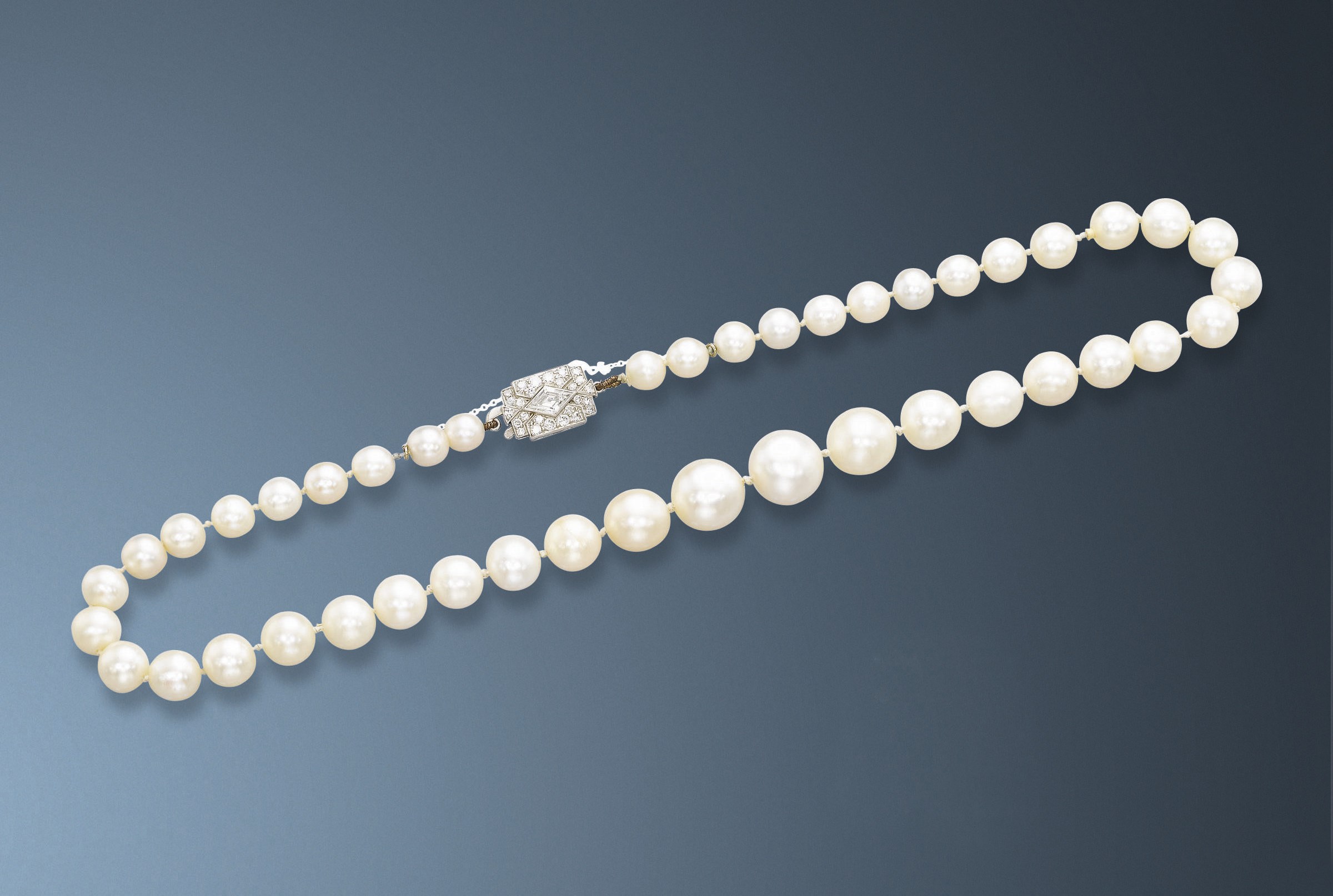 A NATURAL PEARL AND DIAMOND NECKLACE