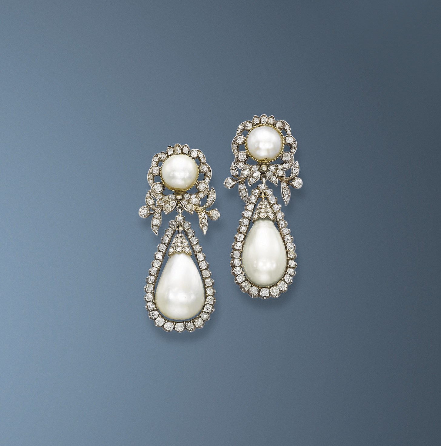 A PAIR OF ELEGANT NATURAL PEARL AND DIAMOND EAR PENDANTS