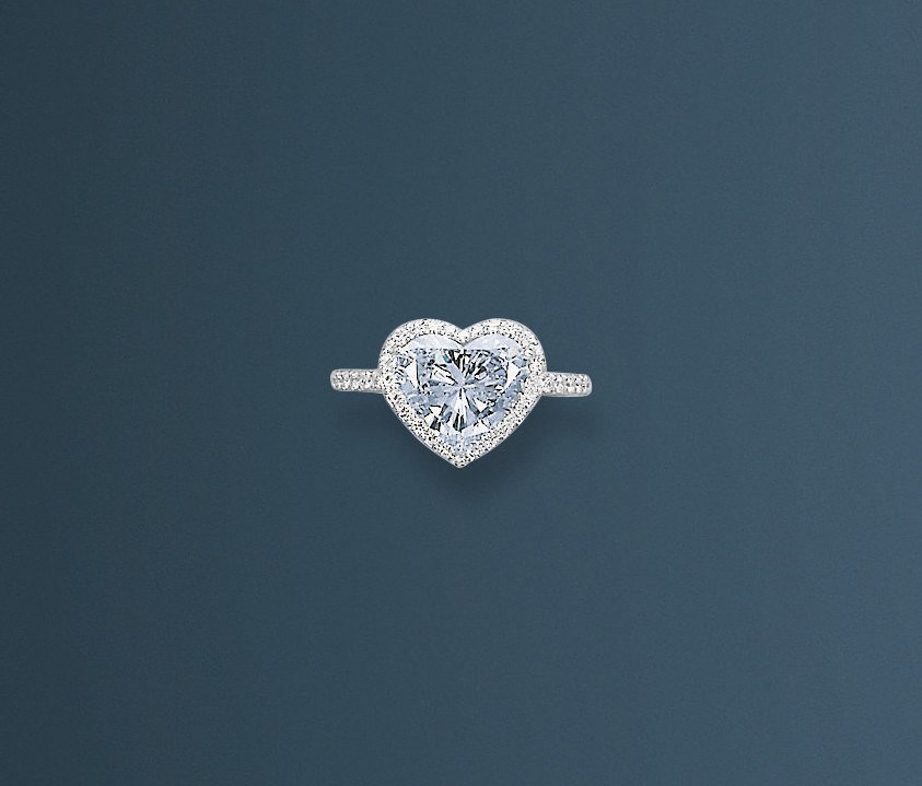 A CHARMING COLOURED DIAMOND AND DIAMOND RING