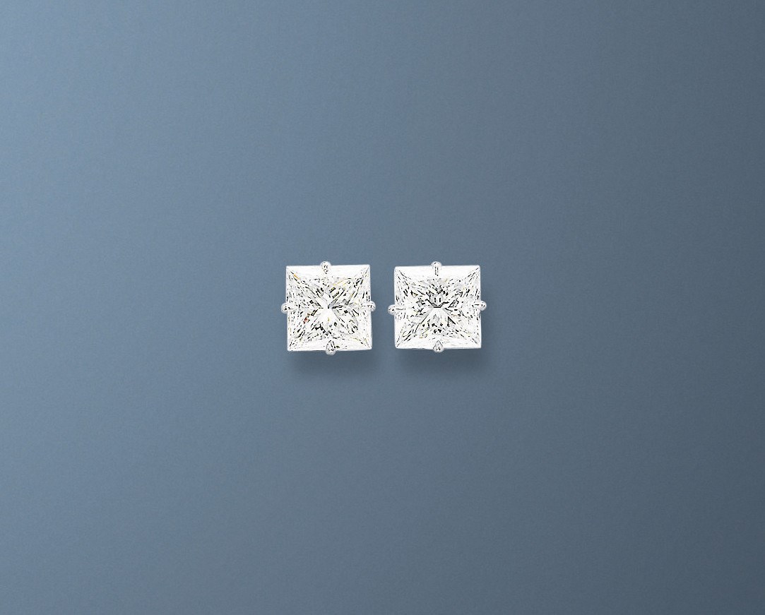 A PAIR OF DIAMOND EAR STUDS