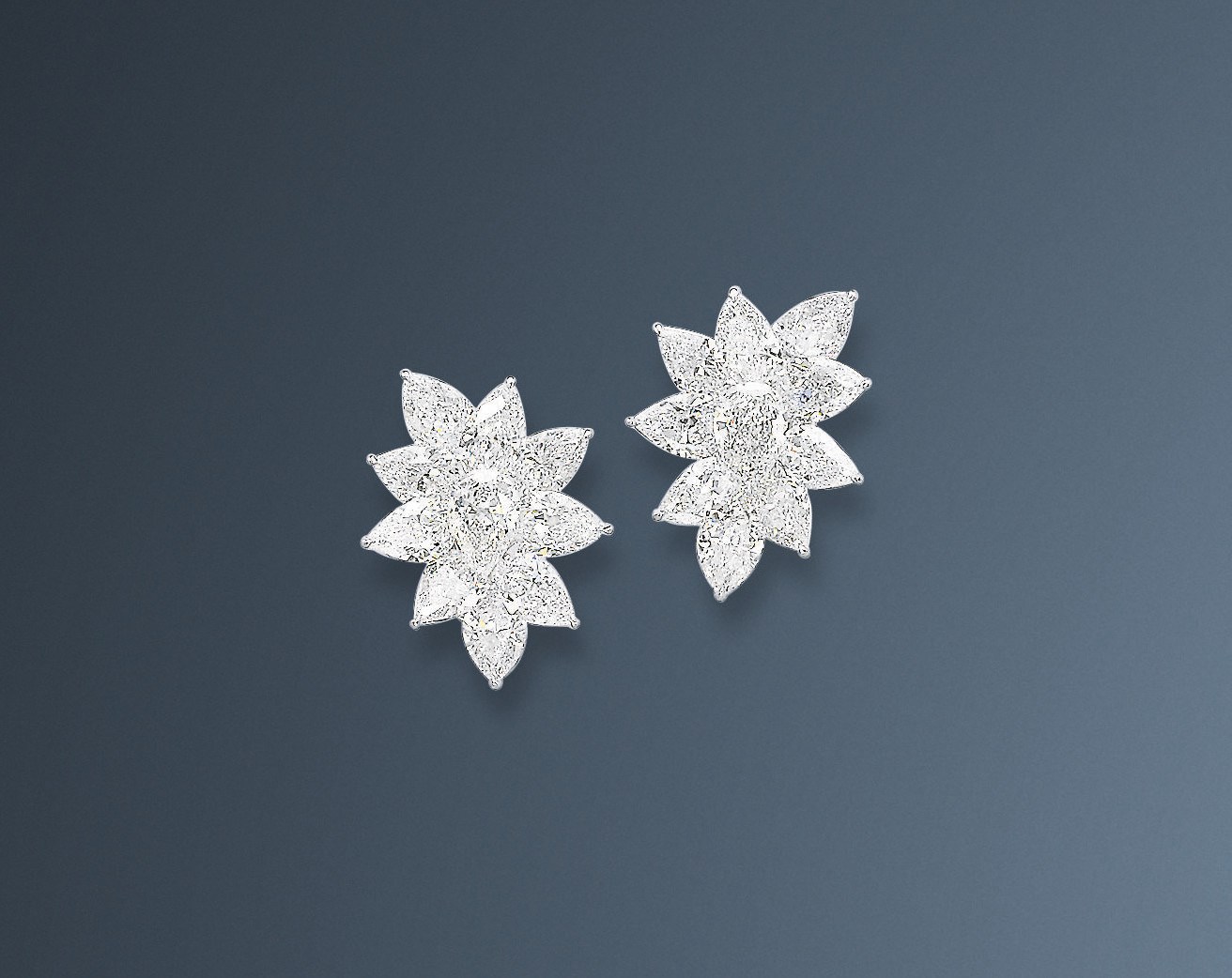 A PAIR OF FINE DIAMOND EAR CLIPS, BY WILLIAM GOLDBERG