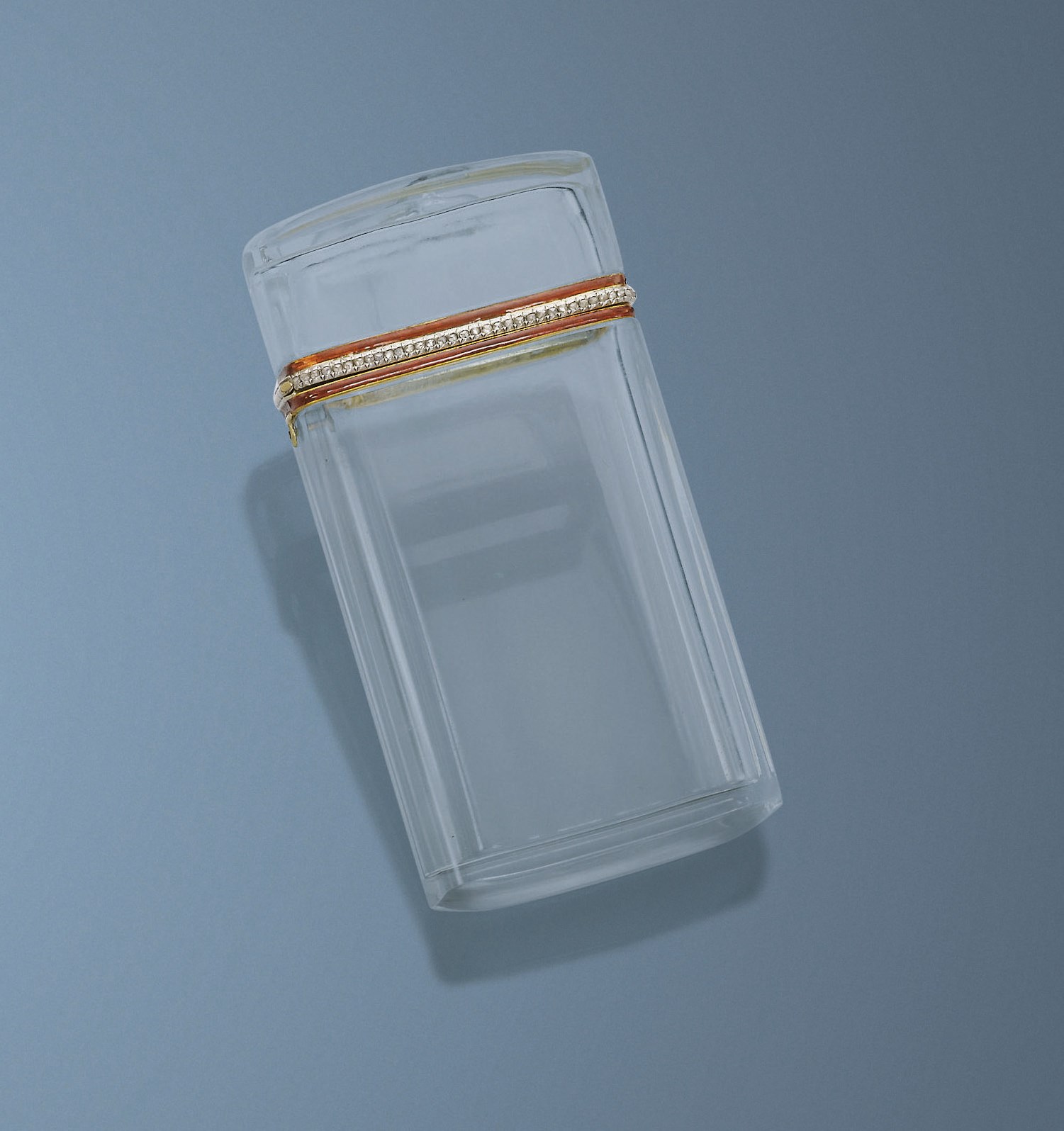 A RARE ROCK CRYSTAL, ENAMEL AND DIAMOND CIGARETTE CASE, BY FABERGÉ