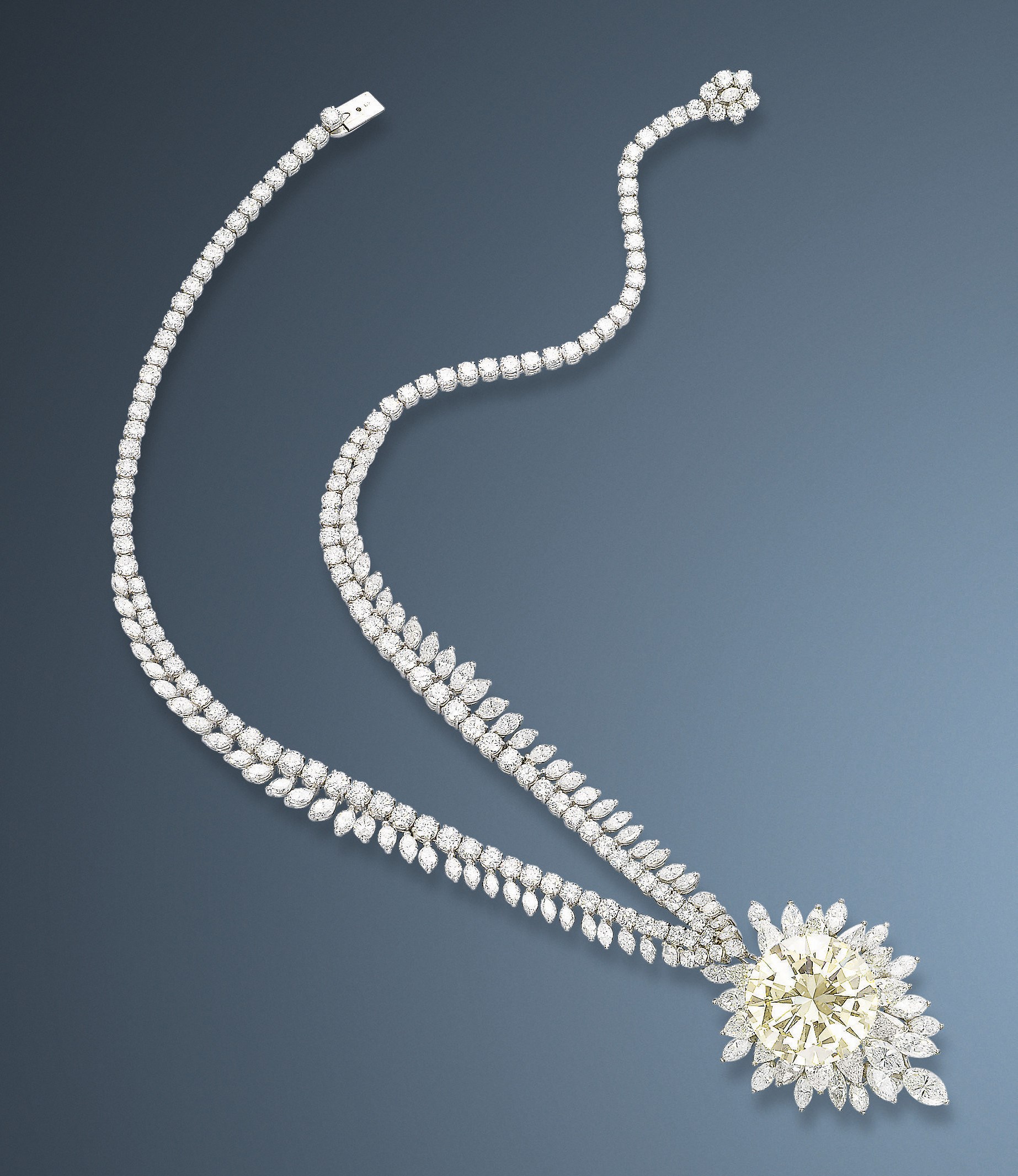 AN IMPORTANT COLOURED DIAMOND AND DIAMOND PENDENT NECKLACE  CLIP BROOCH