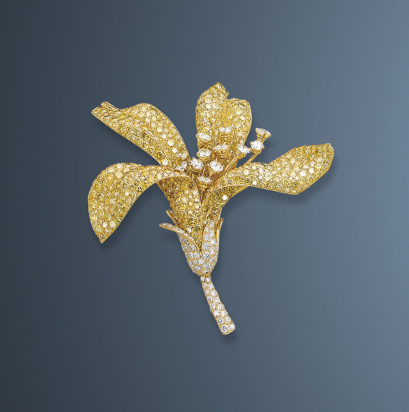 A COLOURED DIAMOND AND DIAMOND FLOWER BROOCH, BY BOUCHERON