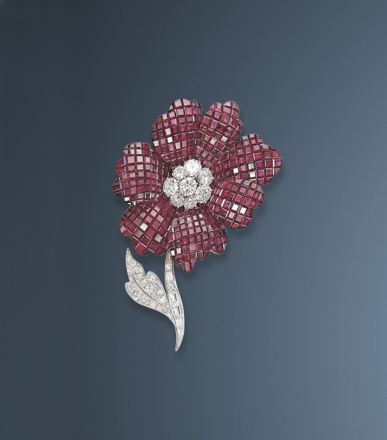 A 'MYSTERY-SET' RUBY AND DIAMOND 'PAVOT' CLIP BROOCH, BY VAN CLEEF & ARPELS