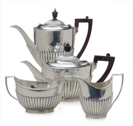AN EDWARD VII SILVER FOUR PIECE TEA SERVICE,