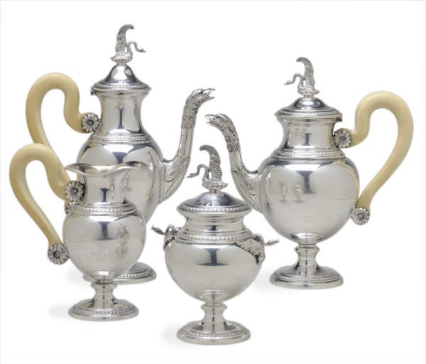 AN ITALIAN SILVER SOLITAIRE FOUR PIECE TEA SET,**