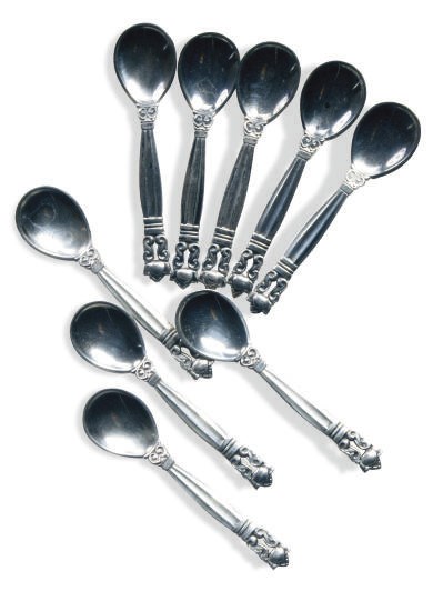 A SET OF NINE DANISH SILVER SALT SPOONS IN THE ACORN PATTERN,