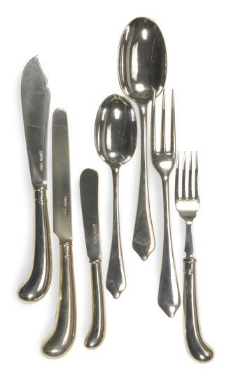 AN ASSEMBLED GEORGE V SILVER FLATWARE SERVICE,