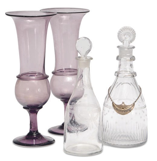 A GROUP OF EIGHT GLASS DECANTERS AND EIGHT STOPPERS, A PAIR OF AMETHYST VASES AND A PAIR OF PAPIER MACHE BOTTLE COASTERS,