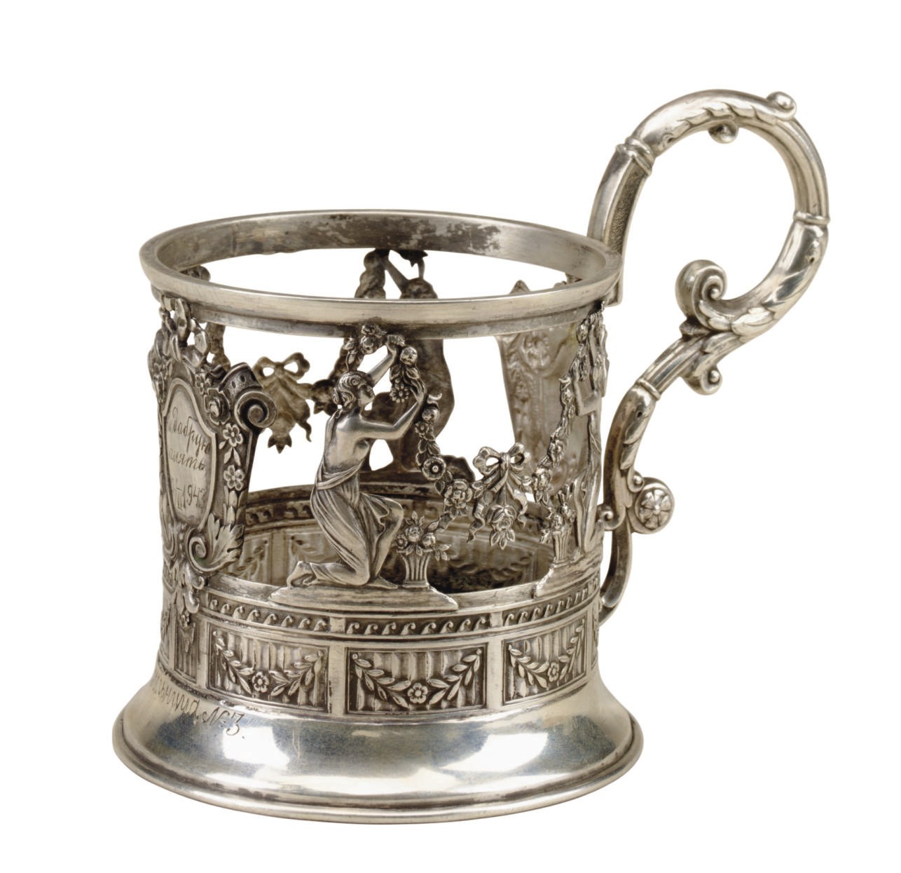 A RUSSIAN SILVER TEA GLASS HOLDER,