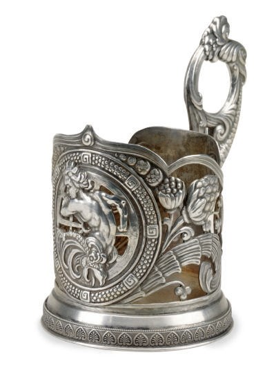 A RUSSIAN SILVER TEA GLASS HOLDER,