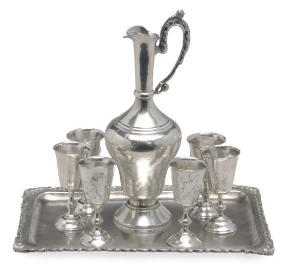 AN ASSEMBLED RUSSIAN SILVER DRINKING SET AND A CONTINENTAL TRAY,