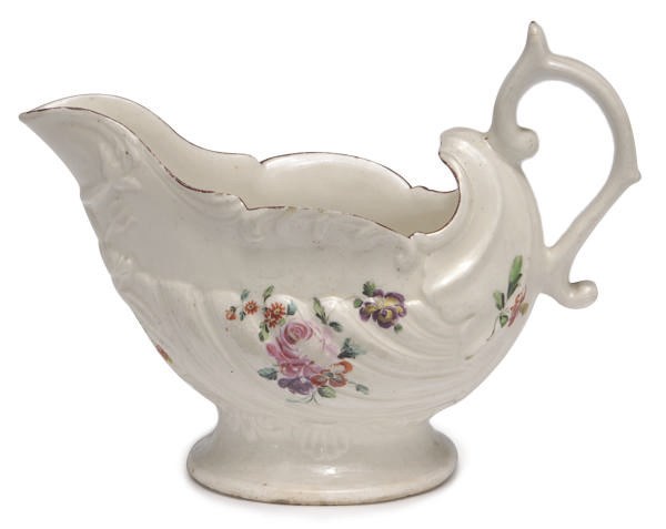AN ENGLISH PORCELAIN SAUCEBOAT,