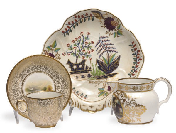 AN ENGLISH PORCELAIN LANDSCAPE-DECORATED CREAM JUG AND SHELL-SHAPED DISH,