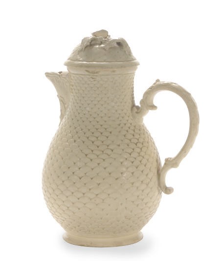 A CONTINENTAL SALT-GLAZED SCALE-MOLDED COFFEE POT AND COVER,