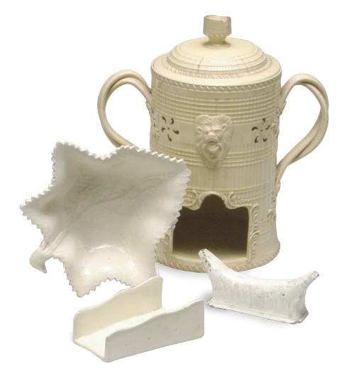 A CONTINENTAL FAIENCE FINE VEILLEUSE, COVER, CANDLE BOWL AND A GROUP OF STAFFORDSHIRE CREAMWARE TABLE WARES,