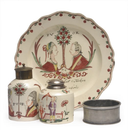 TWO YORKSHIRE CREAMWARE DUTCH-DECORATED WARES COMMEMORATIVE OF THE HOUSE OF ORANGE,