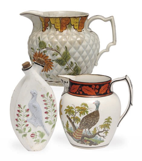 TWO STAFFORSHIRE PEARLWARE JUGS AND A DOUBLE FLASK,