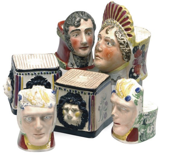 SIX ENGLISH COLD-PAINTED CREAMWARE WINDOW STOPS,