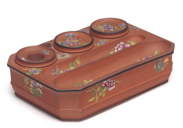 AN ENGLISH CAPRIWARE TERRACOTTA INKSTAND,