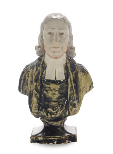 A STAFFORDSHIRE PEARLWARE PORTRAIT BUST OF THE REVEREND JOHN WESLEY,