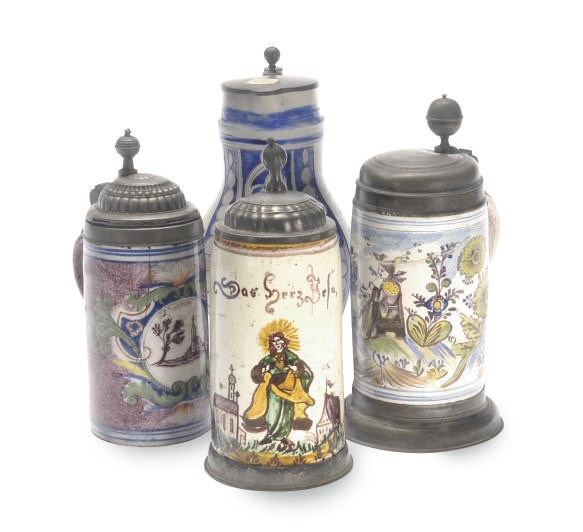 FIVE PEWTER-MOUNTED GERMAN TANKARDS,