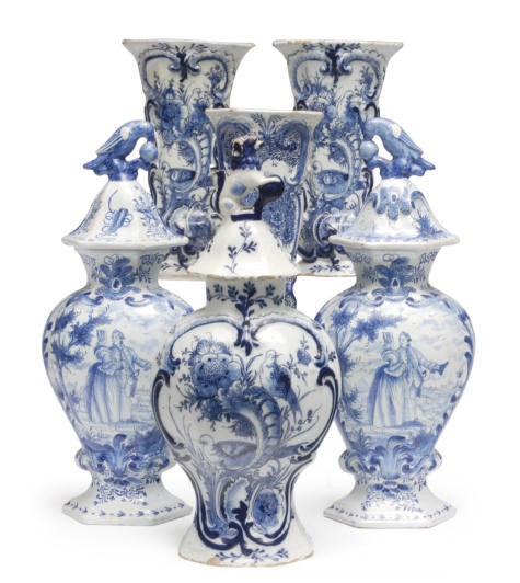 A DUTCH DELFT BLUE AND WHITE THREE-PIECE GARNITURE, AND TWO SIMILAR BALUSTER VASES AND COVERS AND A BEAKER VASE,