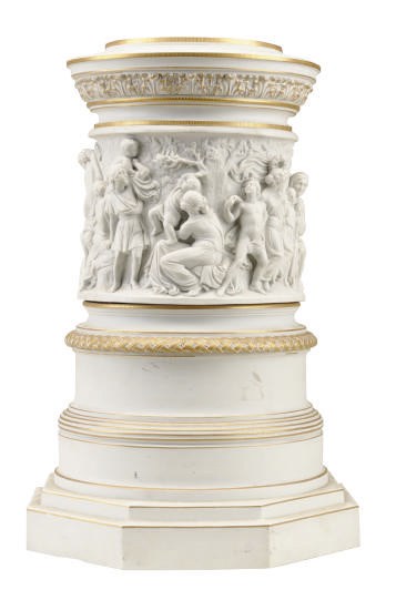 A CONTINENTAL BISCUIT PORCELAIN HAUT RELIEF-MOLDED PLINTH,