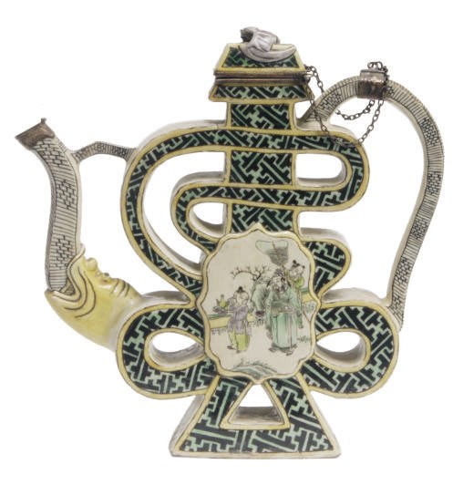 A SILVER-MOUNTED CHINESE GREEN, YELLOW AND AUBERGINE GLAZED TEAPOT IN THE FORM OF A CHARACTER,