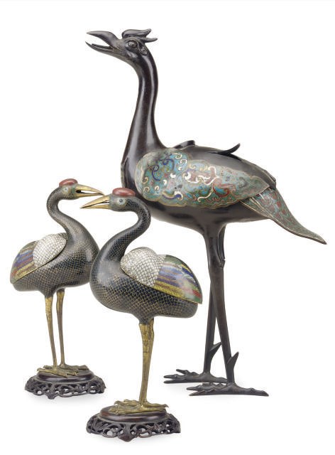 A CHINESE CLOISONNE ENAMEL CRANE-FORM CENSER AND A PAIR OF MODELS OF CRANES ON WOOD STANDS,