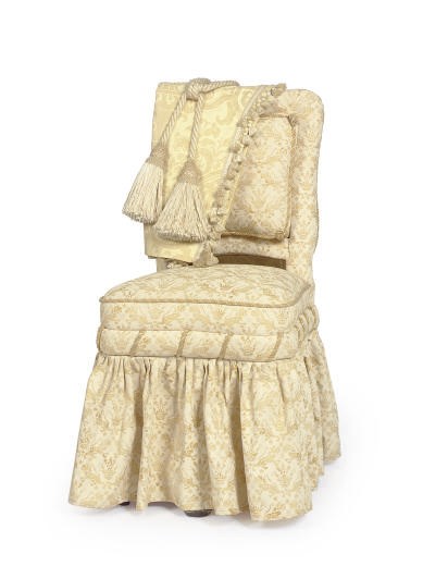 A GROUP OF YELLOW AND FOLD FORTUNY CURTAINS, BED CANOPY, AND A DRESSING TABLE CHAIR,