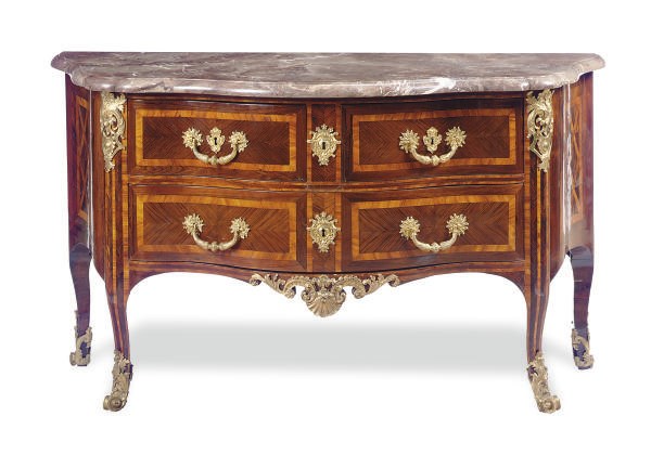 A REGENCE STYLE ORMOLU-MOUNTED KINGWOOD, ROSEWOOD, TULIPWOOD AND MARQUETRY MARBLE TOP COMMODE**,
