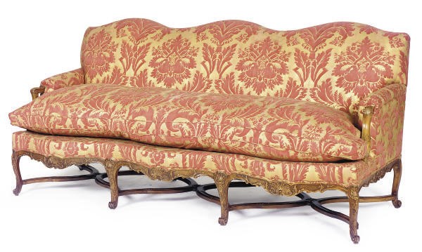 A FRENCH CARVED BEECHWOOD AND RED AND GOLD FORTUNY UPHOLSTERED CANAPE,