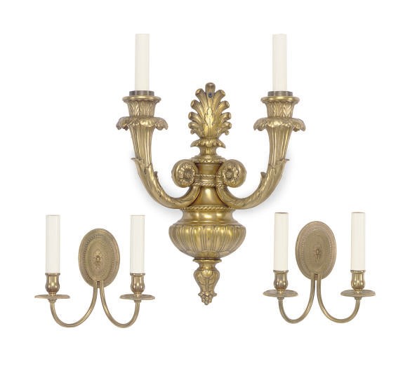 A PAIR OF GILT METAL TWO-BRANCH WALL-LIGHTS TOGETHER WITH A GILT BRONZE TWO-BRANCH WALL LIGHT,