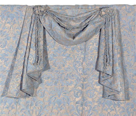 A QUANTITY OF FORTUNY METALLIC GOLD AND BLUE FABRIC AND TWO PELMETS,