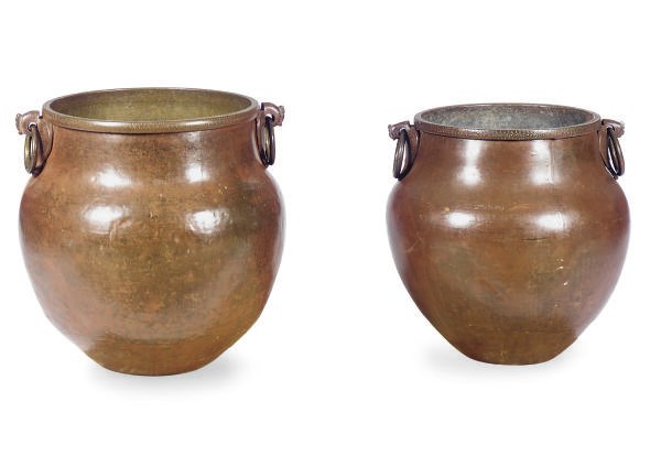THREE RED PAINTED AND COPPER JARDINIERES,