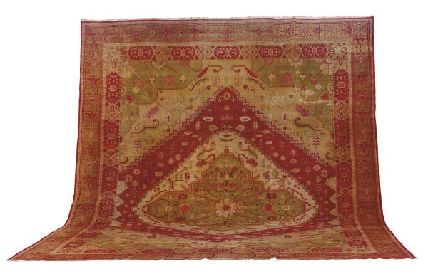 A HEREKE CARPET,
